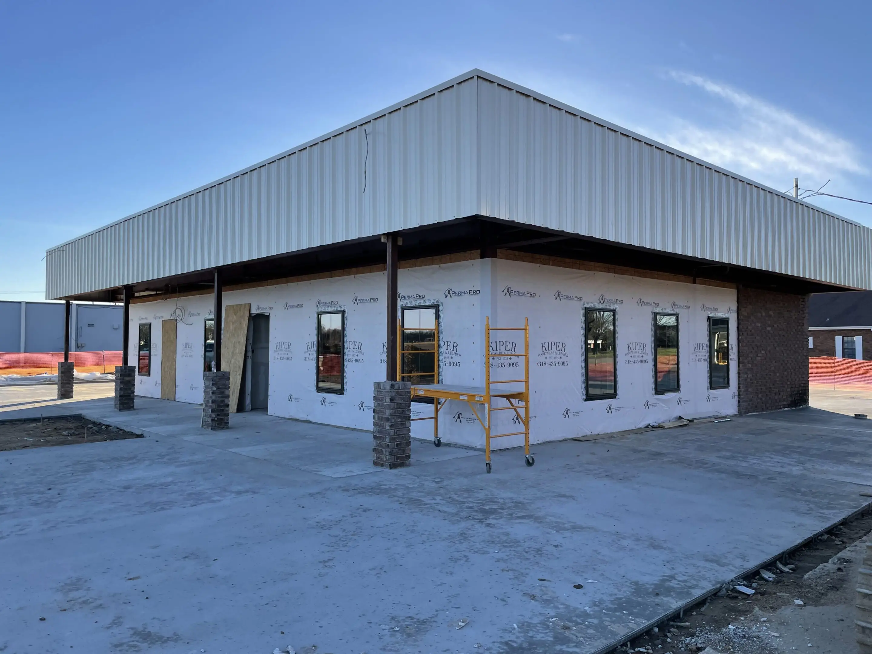 A building that is being built in the street.