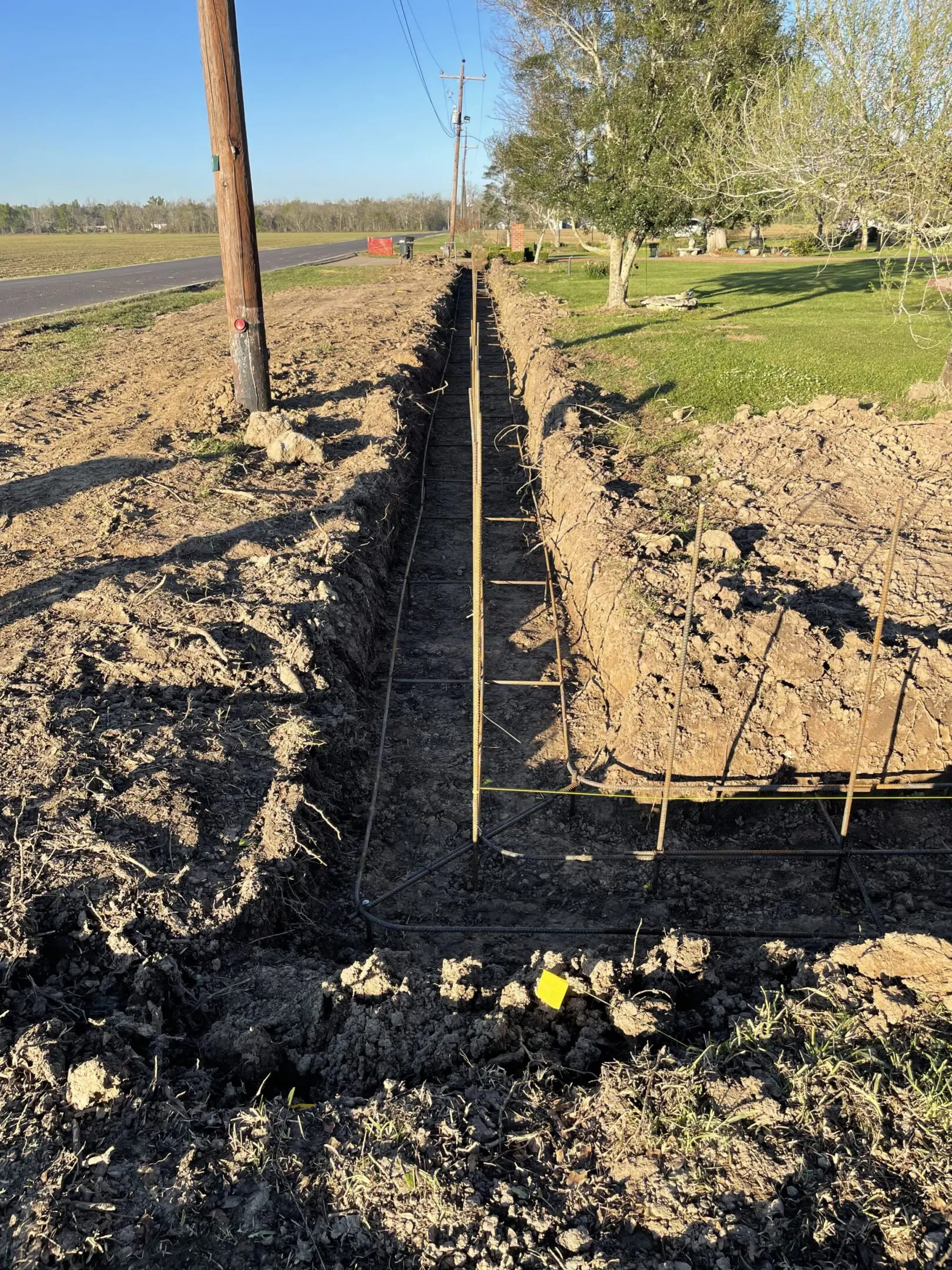 A trench is being dug out of the ground.