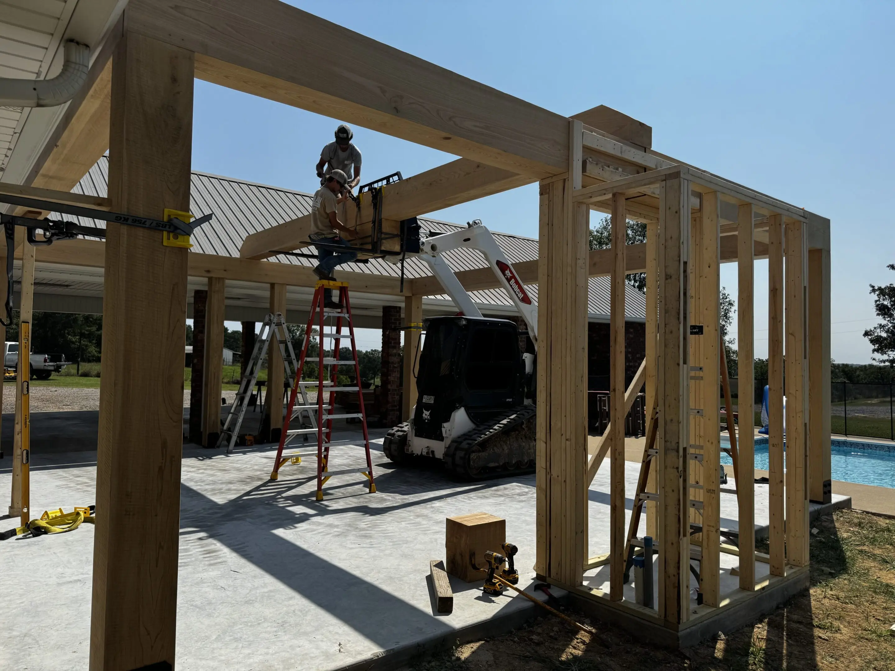 A building being built with scaffolding and wood.